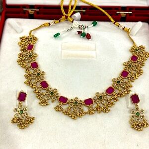 Elegant Gold and Red Necklace